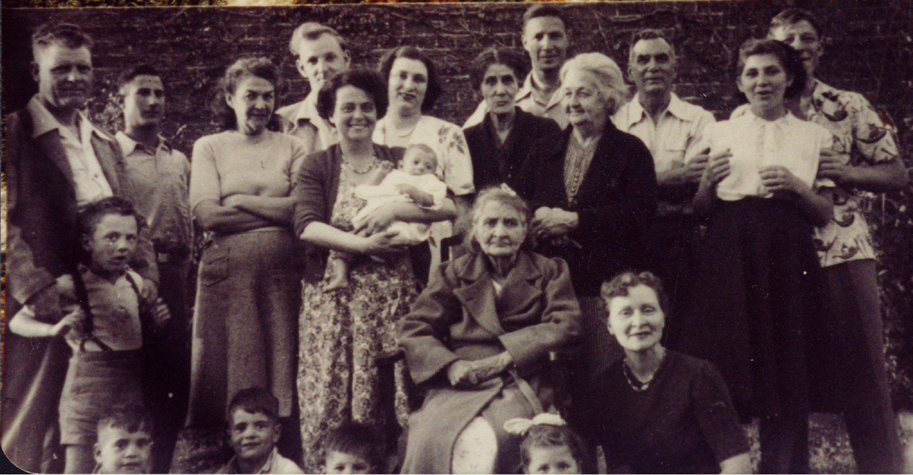 Blance Isabel McCarthy (nee Johnstone), daughter of Alexander Johnstone, sitting with family