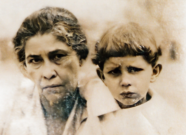 Margarent James (nee Kerr), the niece of Juliana and daughter of wife of Margaret Kerr (nee Johnstone), holding a boy (likely her son Ernest or Henry) c 1897